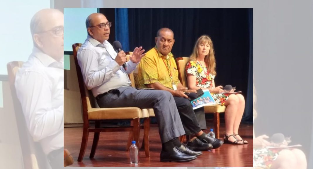 Image: Dr Shailendra Singh responds to a question during a panel discussion at the conference while colleagues Johnson Honimae, CEO and veteran journalist SIBC and Jo Elsom, ABC International Development, listen intently (Source: Supplied)