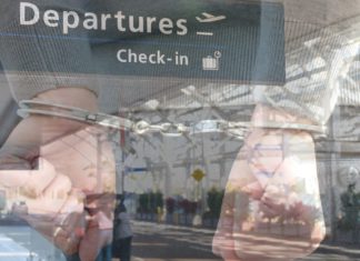 Brisbane man faces court over alleged bomb threat and fake identity on flight Airport arrest; Image Source- CANVA