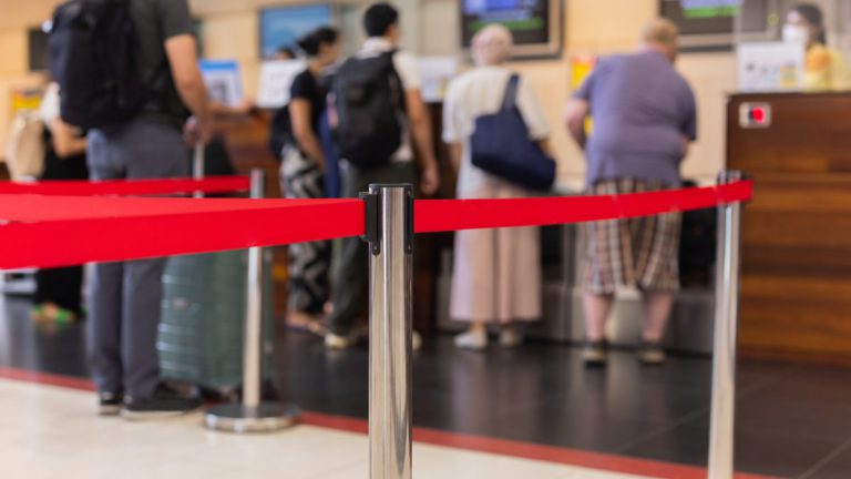 Perth airport worker charged after allegedly breaching airside security to help family board flight