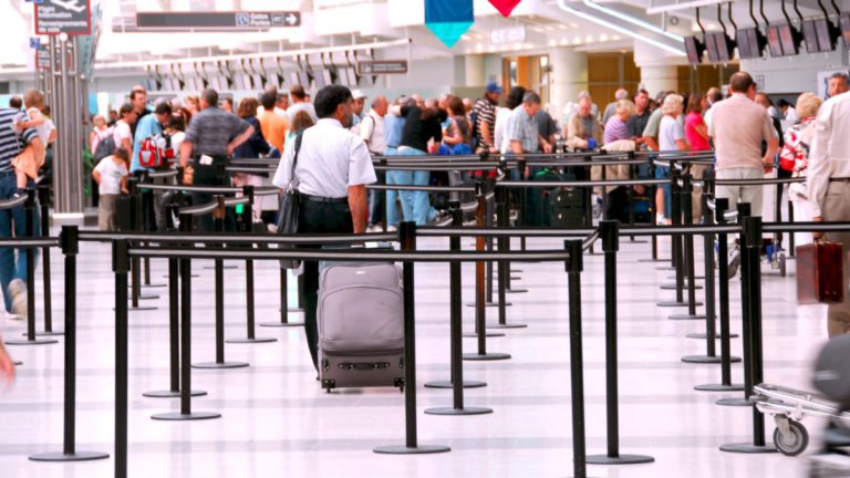 Perth catering worker fined after sneaking family onto international flight