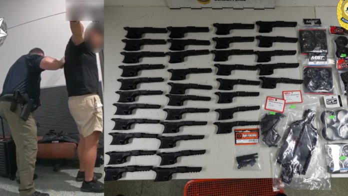 Image: Queensland man charged with attempting to import hundreds of firearm parts from the USA (Source: AFP)