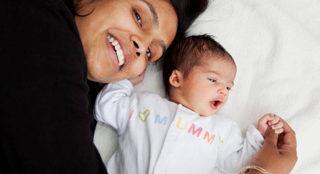 Mom and new born; Image Source: CANVA/The Australia Today