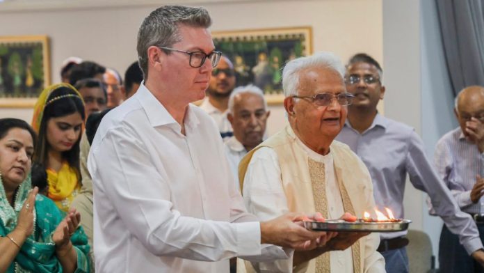 Image: Pat Conroy MP at the Vedic Samiti Temple (Source: Facebook)