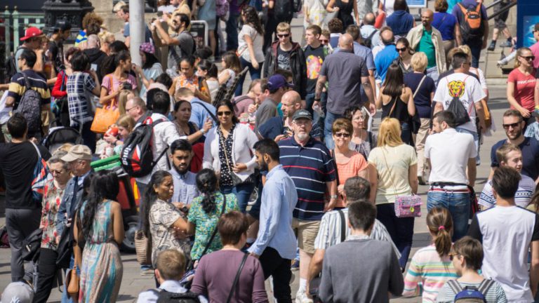 Australians back multiculturalism but worry about migrant intake, surveys suggest