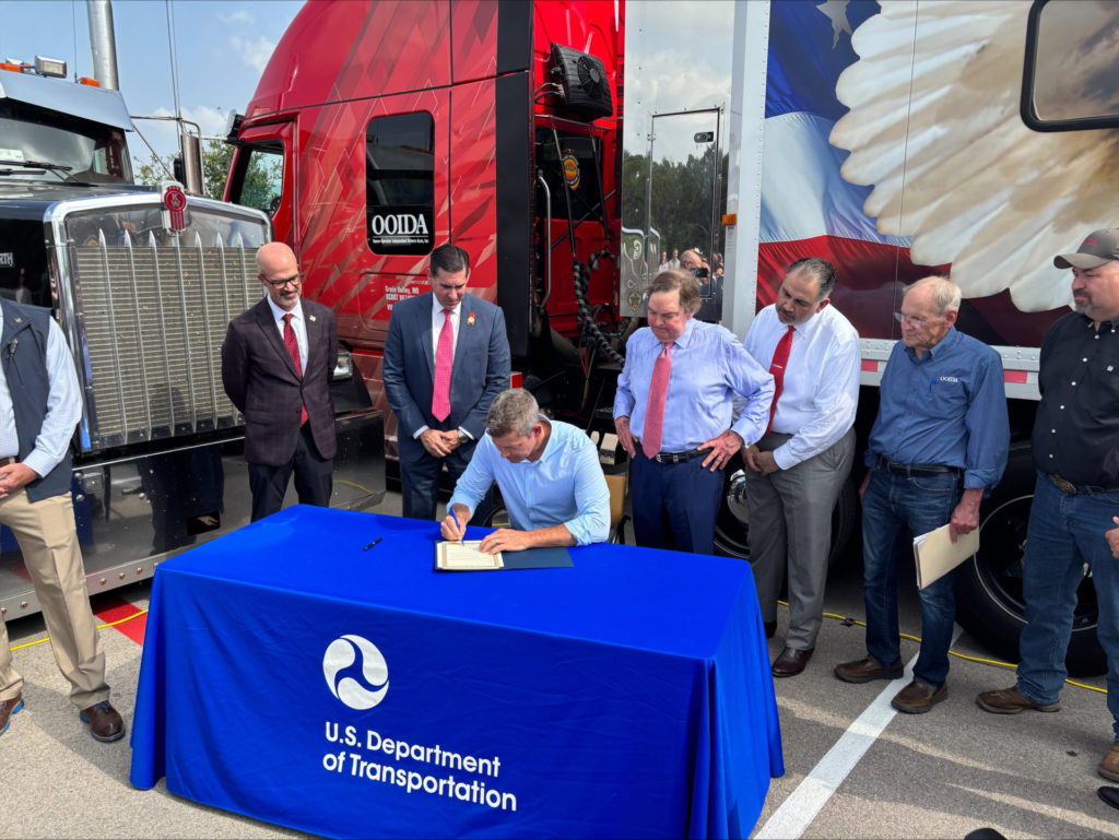 S1 Signing Trucking EO 2