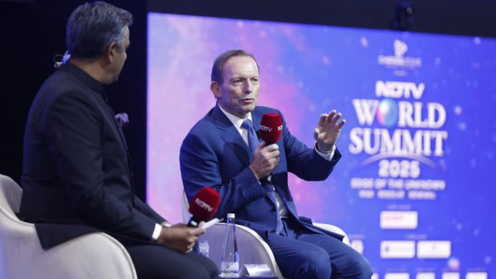 Image: Former Australian Prime Minister Tony Abbott speaking at the NDTV World Summit 2025 (Source: NDTV)