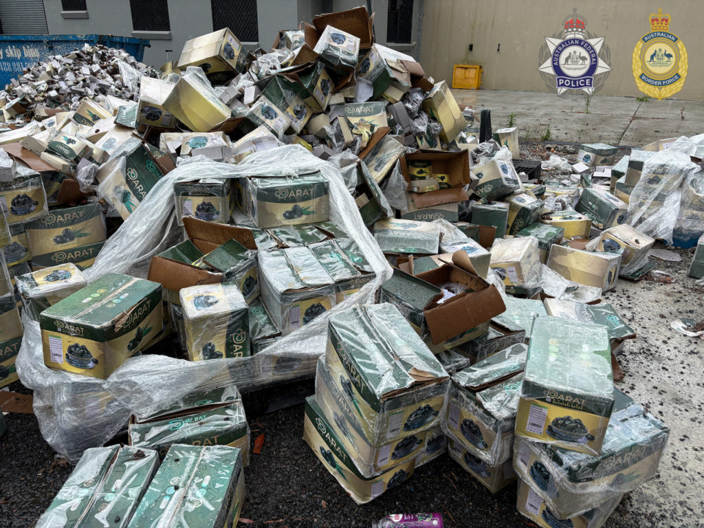 24-year-old charged over 700kg meth shipment hidden in dates 2 Boxes of dates after searching Badged 2