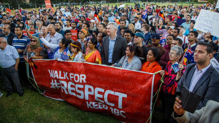 Immigration Minister Tony Burke criticises Coalition policy as “empty” and divisive amid 77,000 without valid visas
