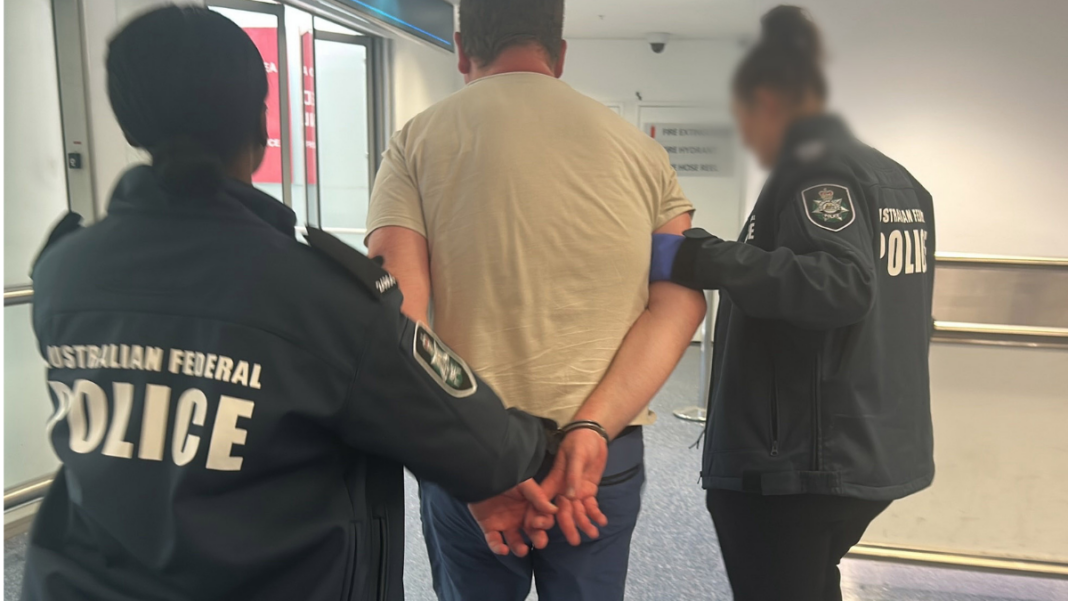 Image: Man charged over alleged threatening calls made offshore (Source: AFP)