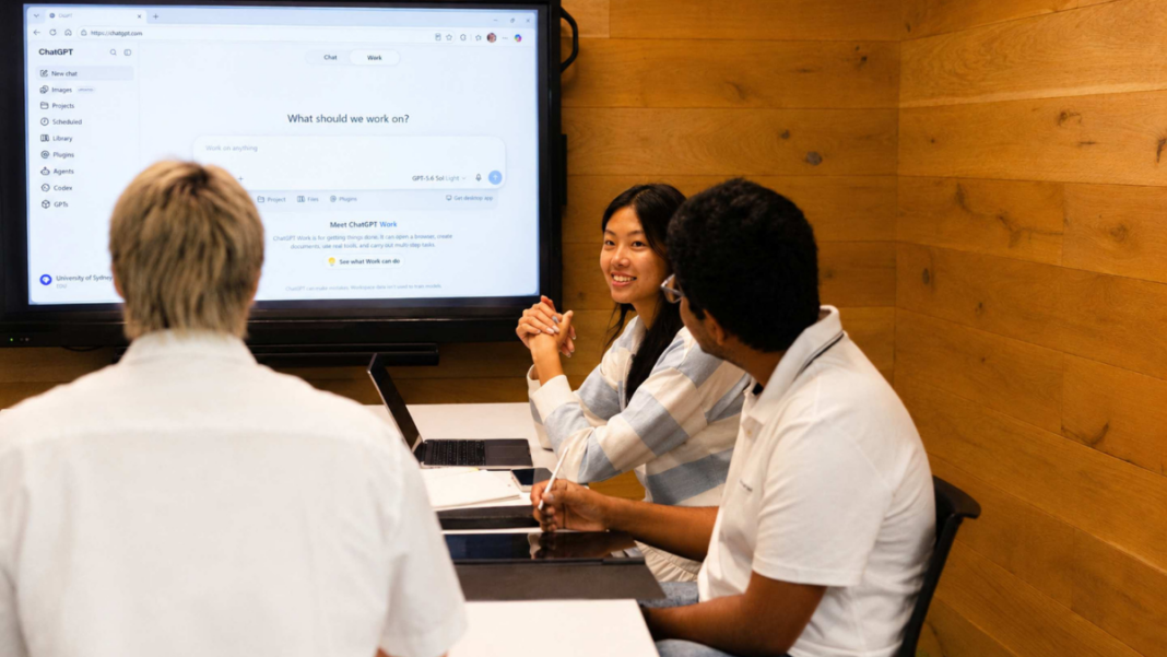 Image: Students Bailor Pan, Jo Ee Ng, Vedant Bansal engage with AI. (Credit University of Sydney/Fiona Wolf)