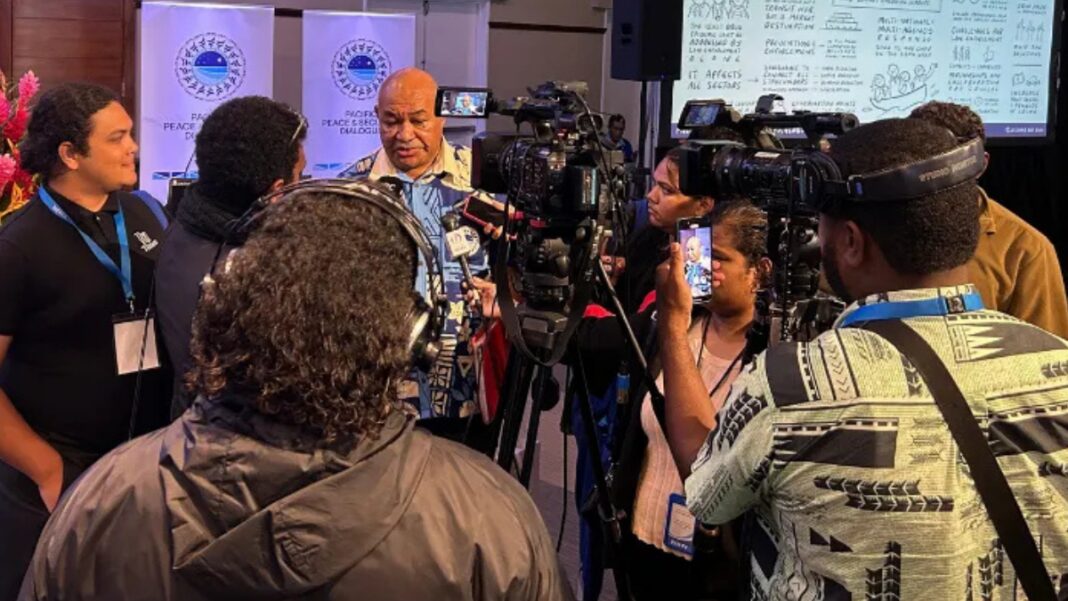 Image: Local journalists conduct an interview at the Pacific Peace and Security Dialogue in Suva in June (Photo: Pacific Security College)