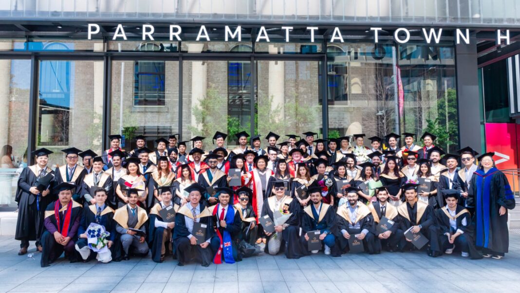 Image: International students graduating with a Bachelor of Business from Churchill Institute of Higher Education (Source: Supplied)